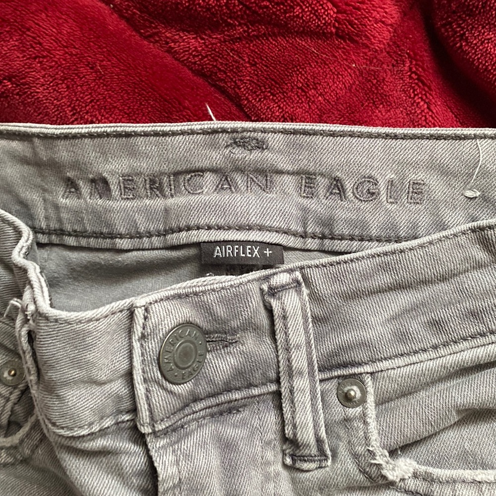 Grey Ripped American Eagle Jeans
